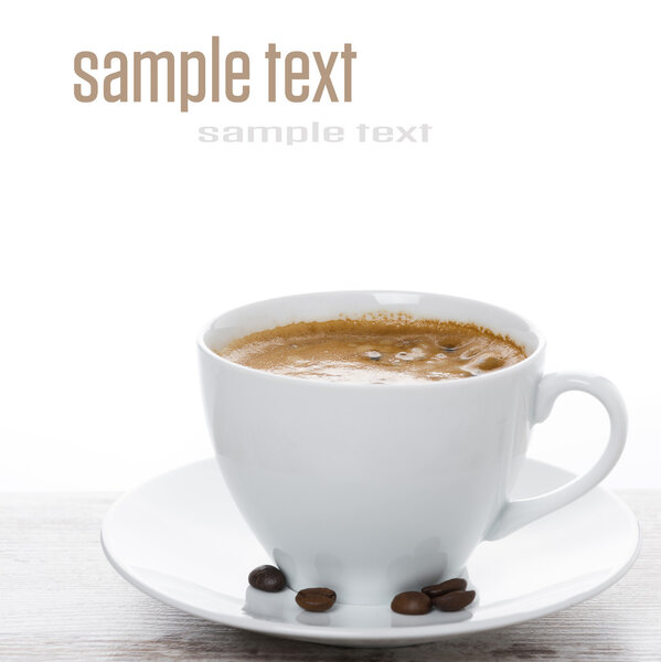 cup of espresso close-up on a white table and space for text