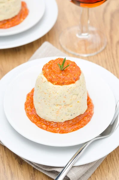 Mousse of chicken with pumpkin, green and red pepper sauce — Stock Photo, Image