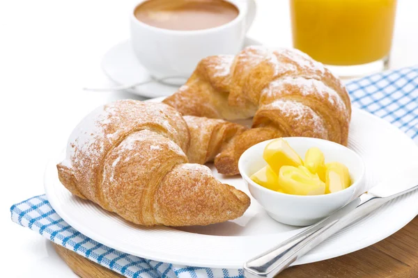 Cruasanes con mantequilla, espresso y zumo de naranja — Foto de Stock