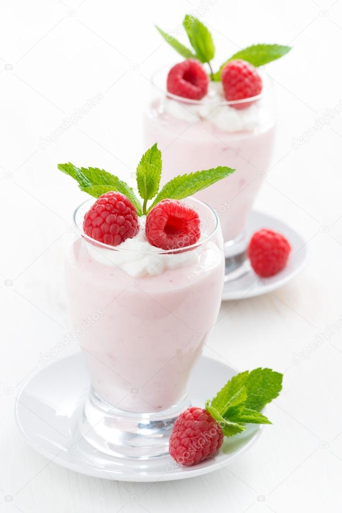 creamy jelly with raspberries in glasses