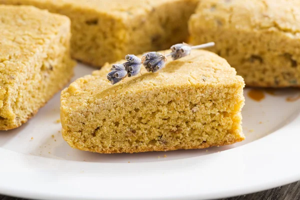 Cornbread with lavender on a plate — Stock Photo, Image