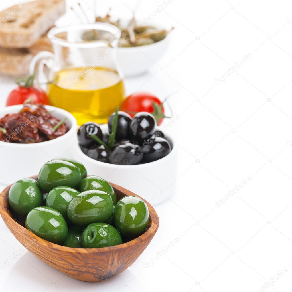 Assorted antipasti - olives, pickles, olive oil and ciabatta