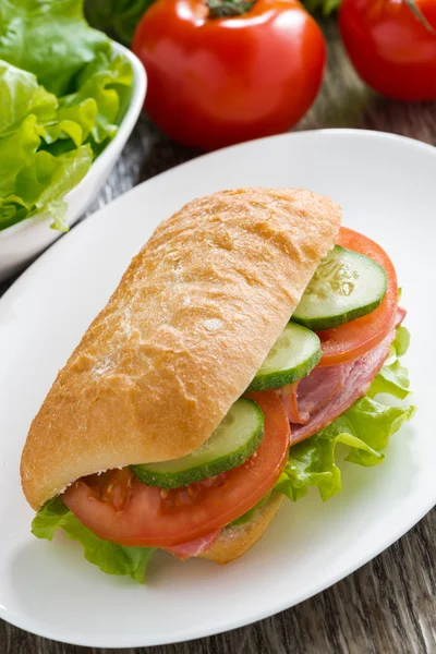 Sandwich with ham and fresh vegetables, top view — Stock Photo, Image