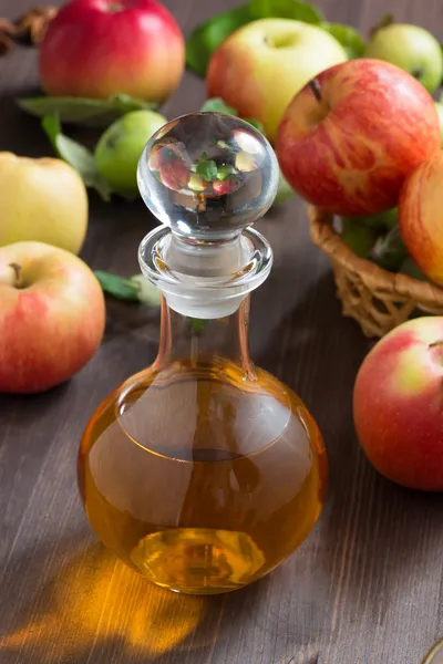 Apple cider or juice in a glass decanter — Stock Photo, Image