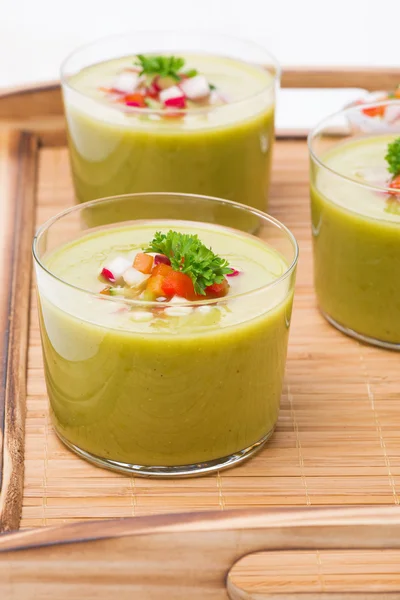 Green soup with fresh vegetables on a wooden tray — Stock Photo, Image