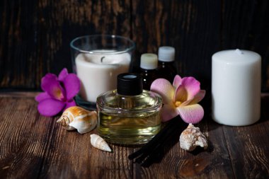 Spa tedavilerinin özellikleri - mumlar, aroma ayırıcı, rattan çubukları ve aroma yağları, yatay
