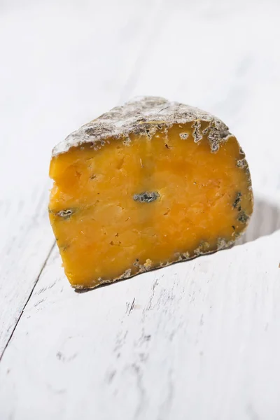 Piece Fresh Farm Cheese Mold White Table Verical Closeup — Stock Photo, Image