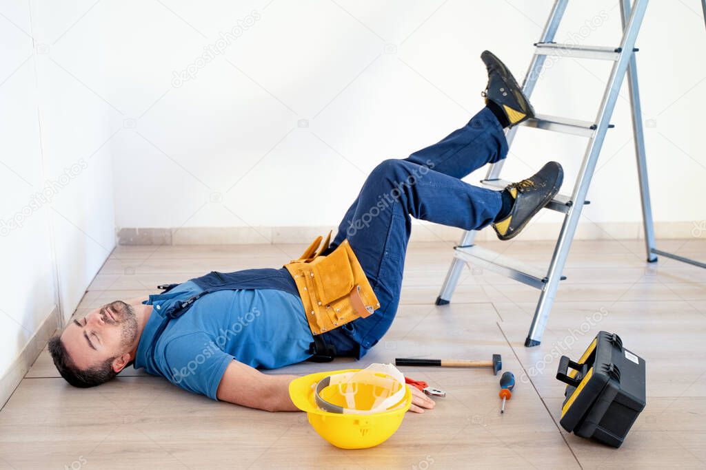 Accident at work prevention concept, worker after job injury