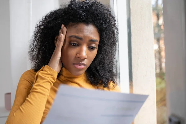 Black Woman Reading Bill Feeling Sad — Stock Photo, Image