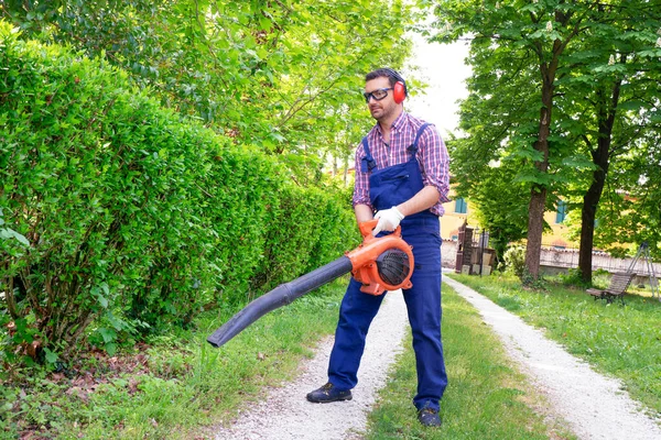 One Gardener Holding Using Leaf Blower — ストック写真
