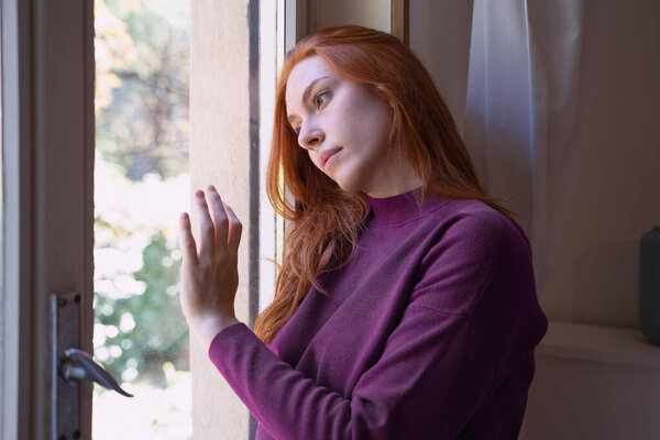 Depressed woman suffering seasonal depression, feeling blue