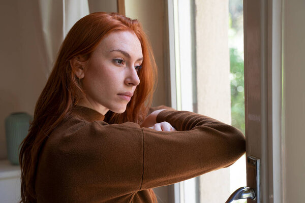 Lonely young woman feeling alone and negative emotion