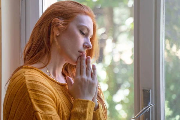 Portrait Young Woman Praying Next Window — Stock fotografie