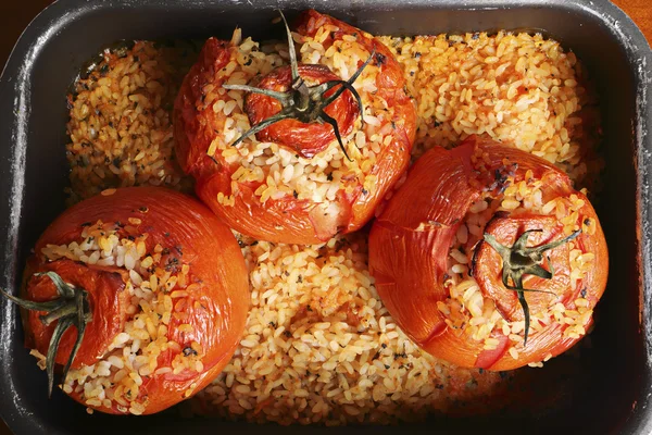 Tomates con arroz Imagen de stock