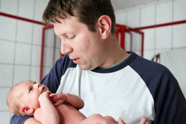 Father and newborn baby boy only few hours old — Stock Photo, Image