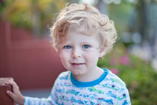 Beautiful toddler boy on balcony — Stock Photo, Image