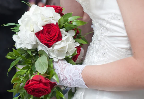 Wedding bouquet of red roses and white flowers Royalty Free Stock Photos