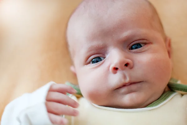 Portrait of cute baby boy with blue eyes — Stock Photo, Image
