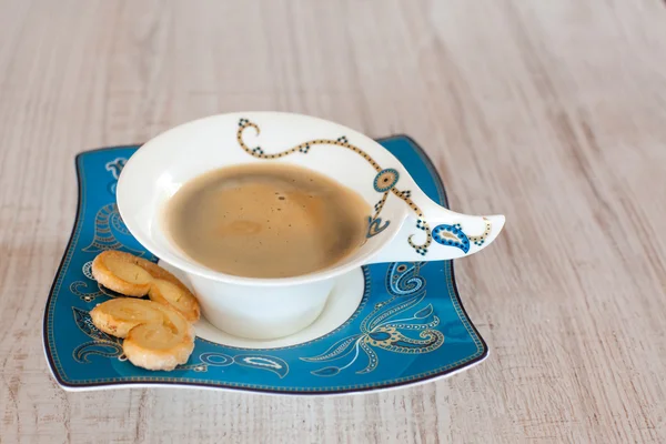 Taza de café sobre fondo de madera — Foto de Stock