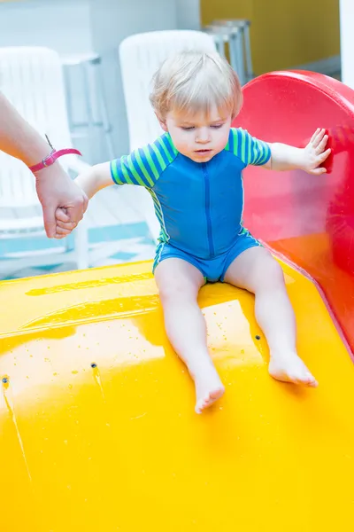 Toddler boy swimming, having fun and playing in water — Stock Photo, Image