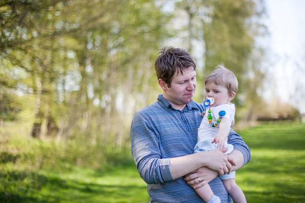 Young father and sweet baby boy in spring forest — Stock Photo, Image