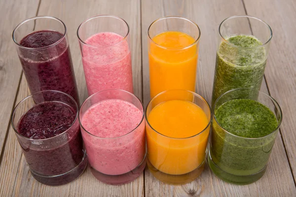 Four fruit, berry and vegetables healthy smoothies — Stock Photo, Image