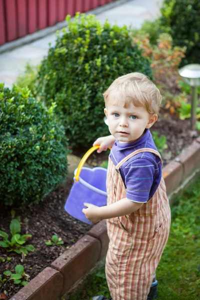 Little toddler boy of one year in summer garden — Stock Photo, Image