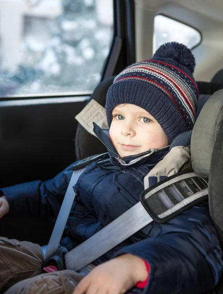 Adorable toddler boy in safety car seat — Stock Photo, Image