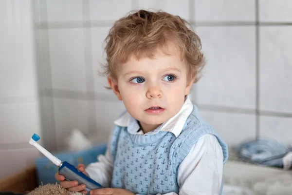 Adorable toddler with blue eyes indoor — Stock Photo, Image