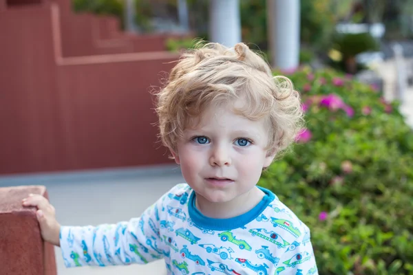 Beautiful toddler boy on balcony — Stock Photo, Image