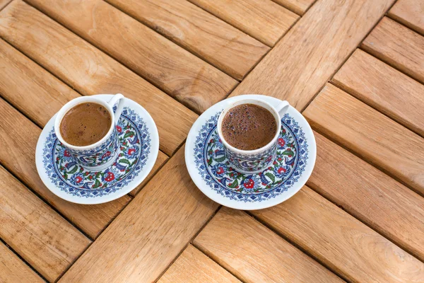 Traditional fresh turkish coffee on wooden table — Stock Photo, Image