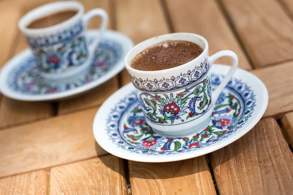 Traditional fresh turkish coffee on wooden table — Stock Photo, Image