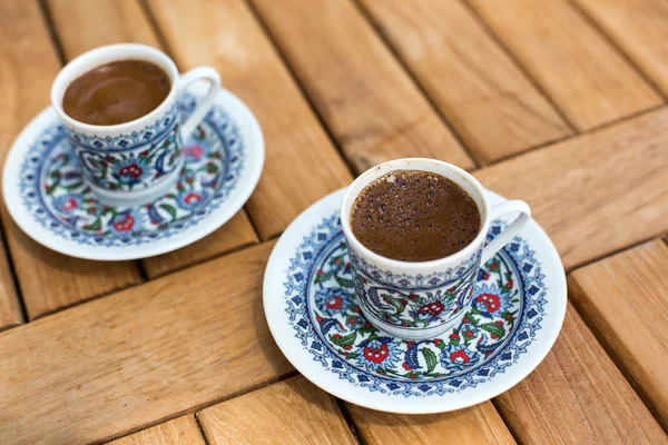 Traditional fresh turkish coffee on wooden table — Stock Photo, Image