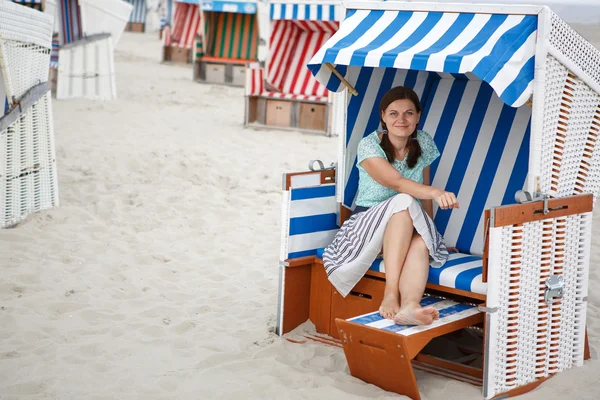 Young happy woman on the beach of St.Peter Ording, North Sea, — Stock Photo, Image
