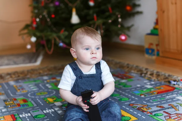 Little baby boy and Christmas tree — Stock Photo, Image