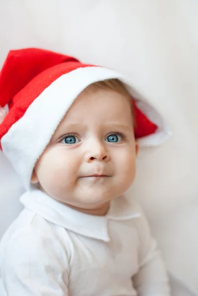 Baby boy with Christmas cap — Stock Photo, Image