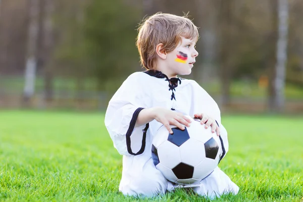 Little fan boy at public viewing of soccer or football game — Stock Photo, Image