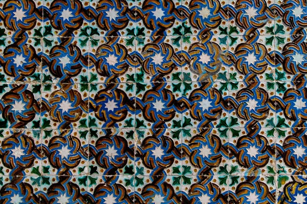 Traditional tiled wall decoration in a city palace in Seville, Spain. — Photo