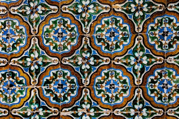 Traditional tiled wall decoration in a city palace in Seville, Spain. — Photo