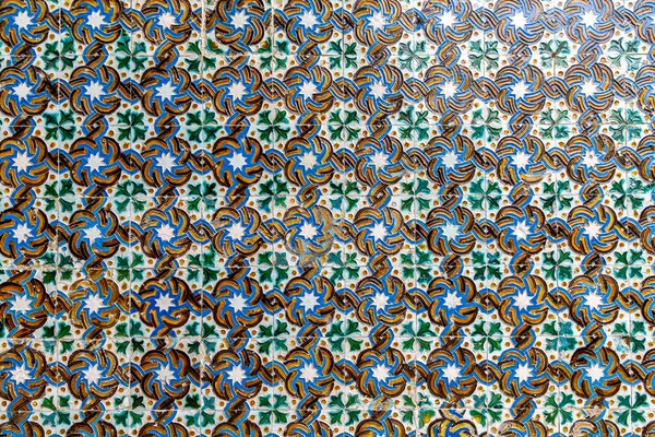 Traditional tiled wall decoration in a city palace in Seville, Spain. — Photo