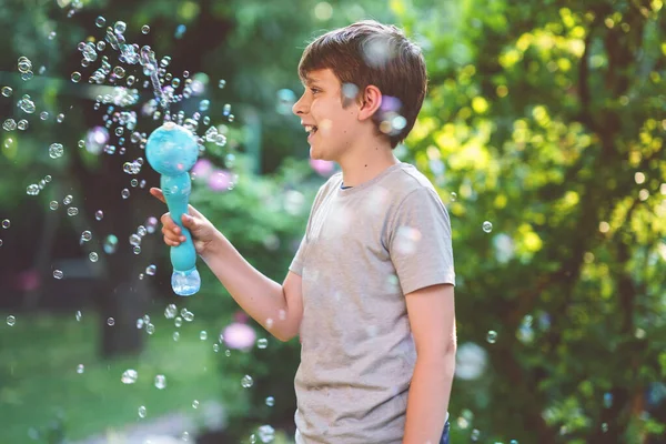 Happy Kid Boy Having Fun Blowing Soap Bubble Blower Preteen — Stock Fotó