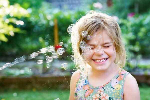 Happy Little Blonde Preschool Girl Having Fun Blowing Soap Bubble — Stock Photo, Image