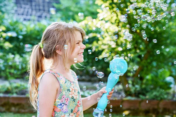 Happy Little Blonde Preschool Girl Having Fun Blowing Soap Bubble — Stock Photo, Image