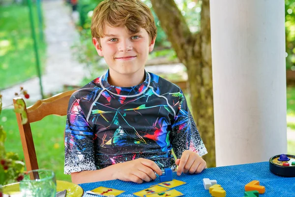 School Boy Playing Board Game Colorful Bricks Happy Child Build — Zdjęcie stockowe