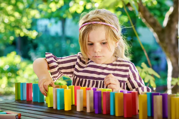 Little Preschool Girl Playing Board Game Colorful Bricks Domino Happy — стоковое фото