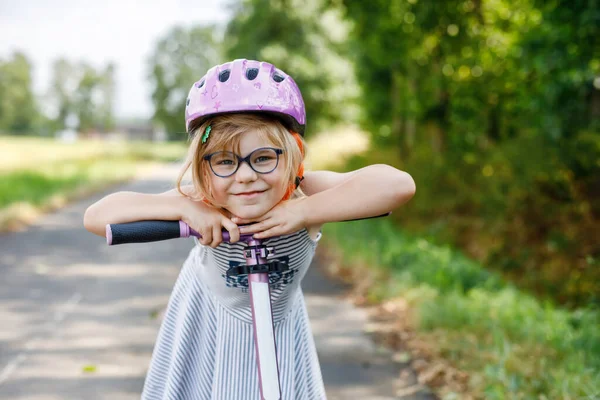 Portrait Active Little Preschool Girl Glasses Helmet Riding Scooter Road — 图库照片