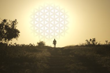 Man comes from the setting sun in the form of flower of life clipart