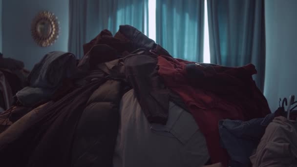 Large pile of clothing — стоковое видео