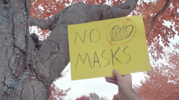 Holding no mask sign up in fall — Video Stock