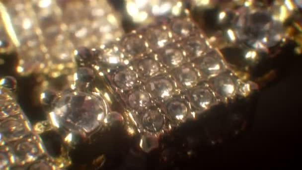 Gold and diamond bling moving — Stock video